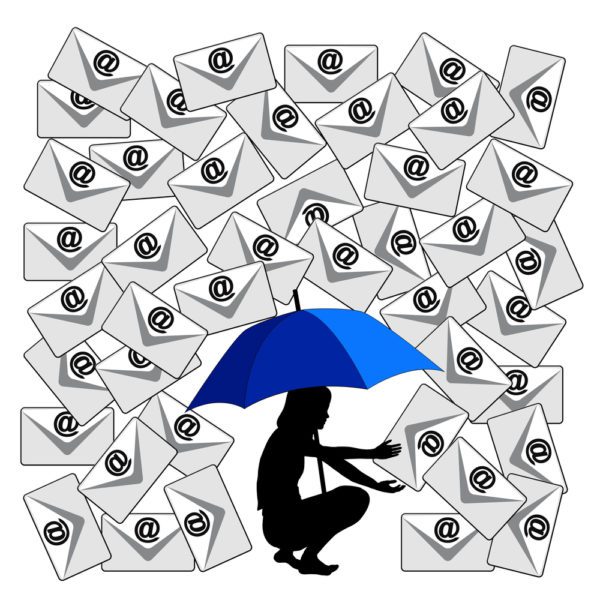 illustrated figure of woman holding an umbrella to stop a storm of work emails