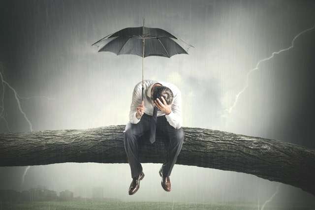 desperate man crying under rain illustration of man sitting in the rain